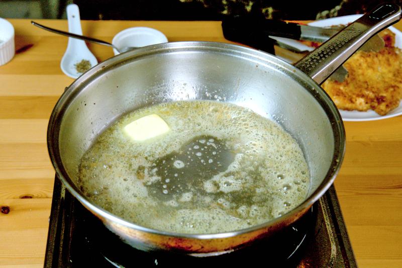 Add butter to the pan; when it has melted, add flour and mix continuously to form a roux.